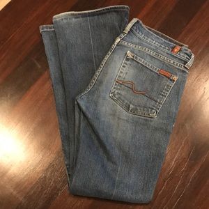 7 for all Mankind jeans. Small hole on left calf.
